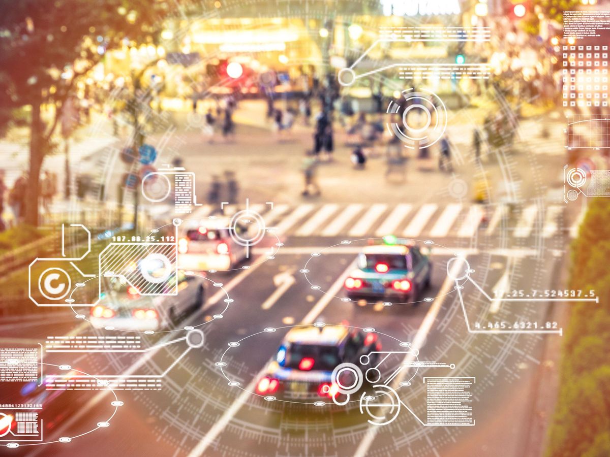 人工智能屏幕的插图，背景是散焦的汽车网上亚博Ayabo2016